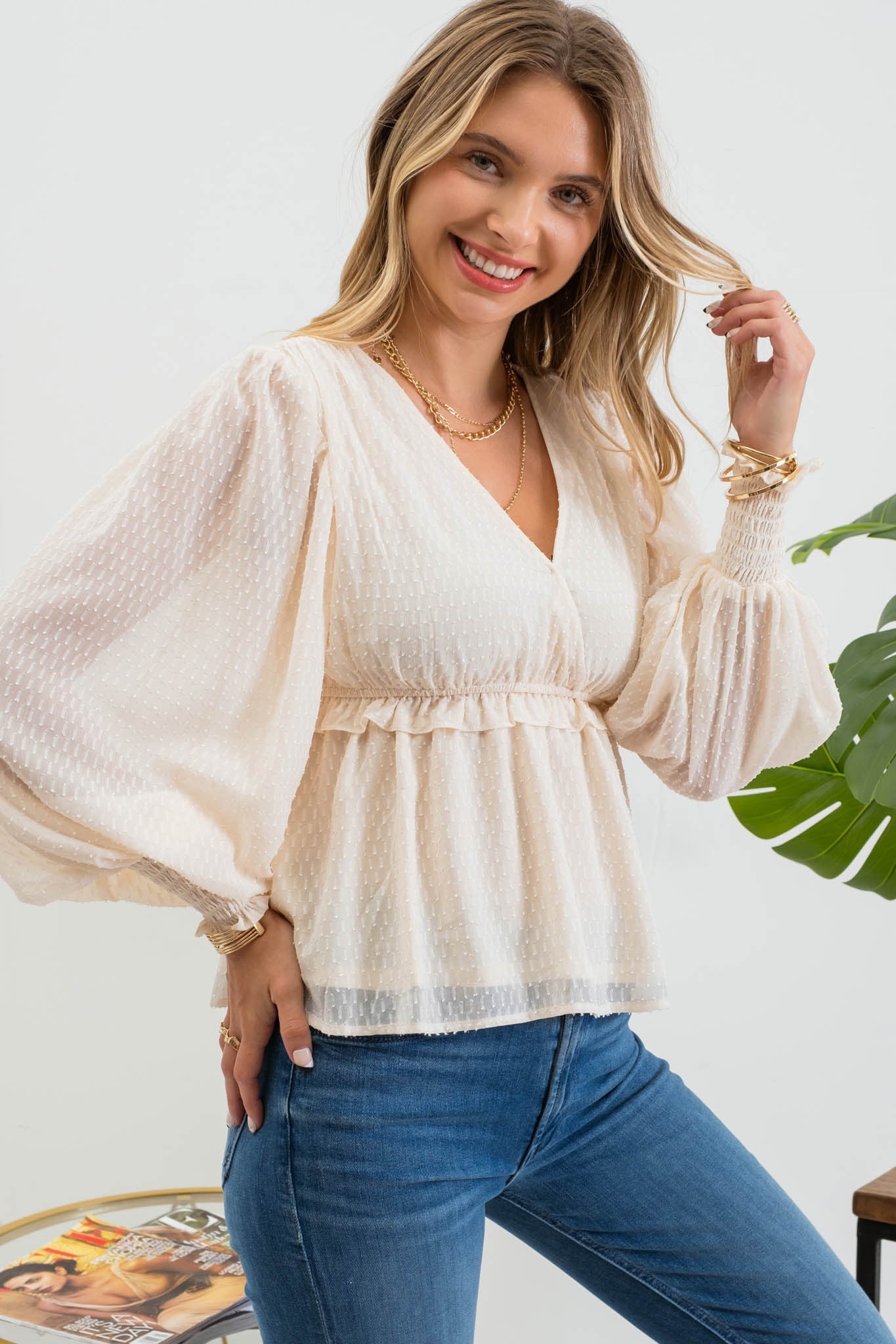 Textured Ivory Peplum Top